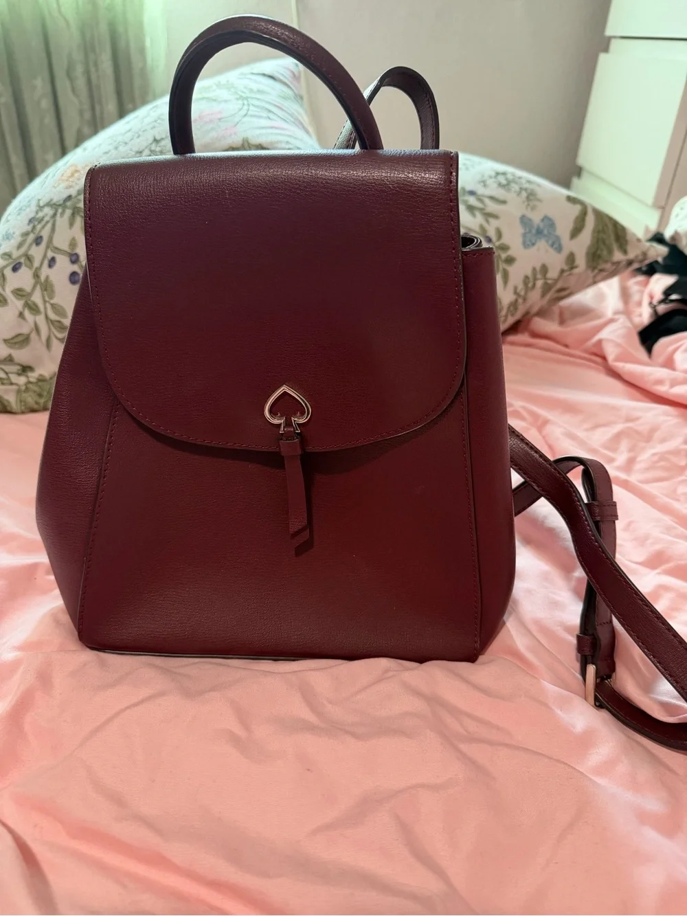 kate spade burgundy leather backpack with heart clasp
